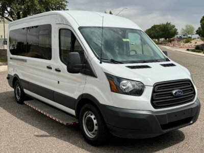 White Ford Transit with BraunAbility Rear Entry Automatic Fold Out conversion