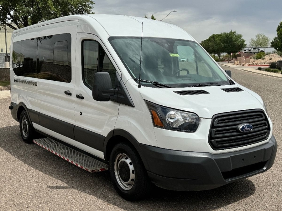 White Ford Transit with BraunAbility Rear Entry Automatic Fold Out conversion