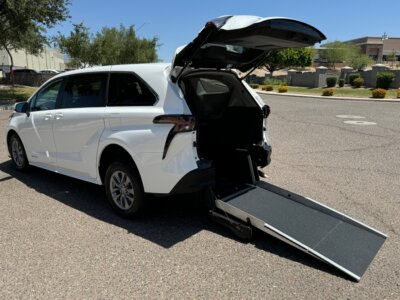 White Toyota Sienna with Driverge Rear Entry Manual Fold Out conversion