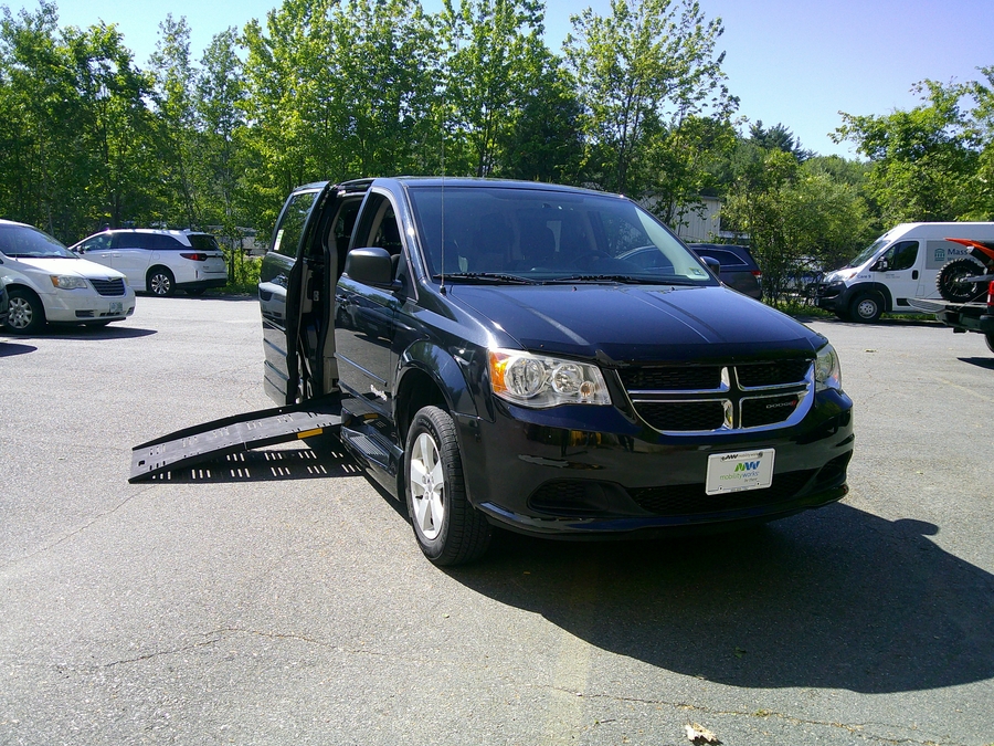 Black Dodge Grand Caravan with BraunAbility Side Entry Automatic Fold Out conversion