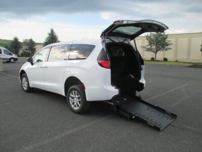 White Chrysler Voyager with FR Conversions Rear Entry Manual Fold Out conversion