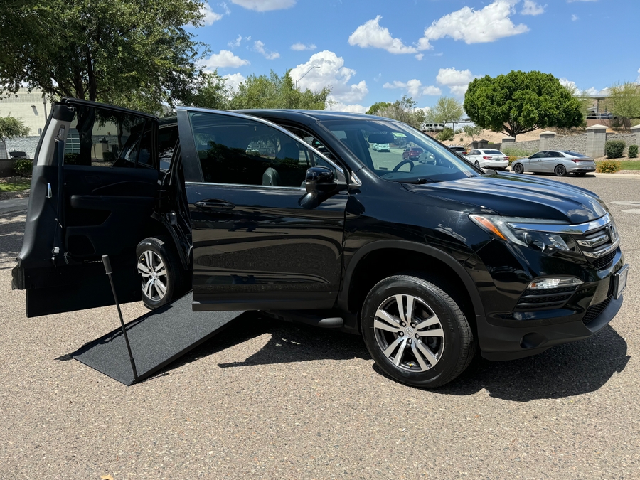Black Honda Pilot with Vantage Mobility Side Entry Manual In Floor conversion