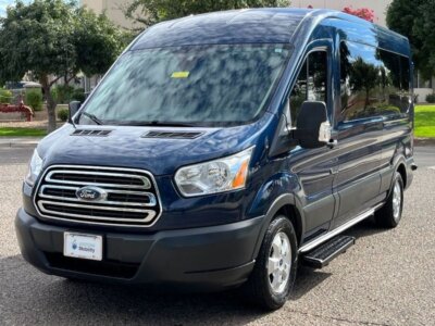 Blue Ford Transit with BraunAbility Rear Entry Automatic Fold Out conversion