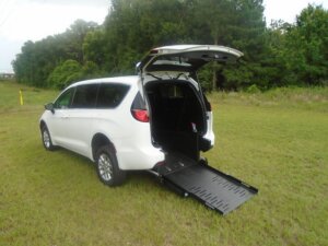 White Chrysler Voyager with FR Conversions Rear Entry Manual Fold Out conversion
