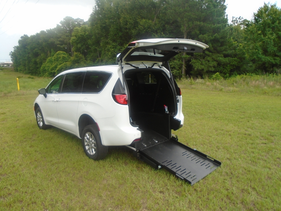 White Chrysler Voyager with FR Conversions Rear Entry Manual Fold Out conversion