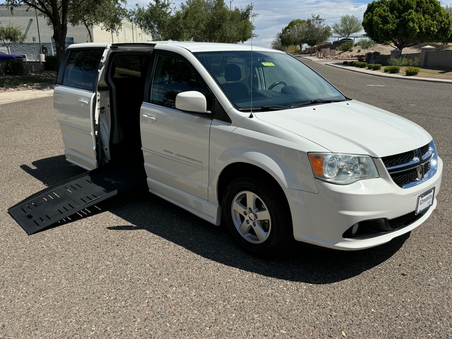 White Dodge Grand Caravan with BraunAbility Side Entry Manual Fold Out conversion
