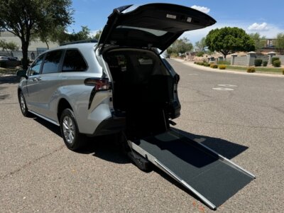 Silver Toyota Sienna with Driverge Rear Entry Manual Fold Out conversion