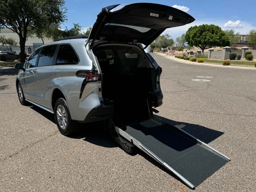 Silver Toyota Sienna with Driverge Rear Entry Manual Fold Out conversion