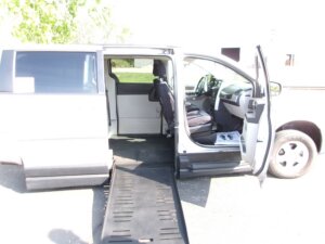 Silver Dodge Grand Caravan with BraunAbility Side Entry Automatic Fold Out conversion