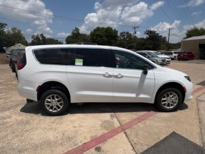 White Chrysler Voyager with FR Conversions Rear Entry Manual Fold Out conversion