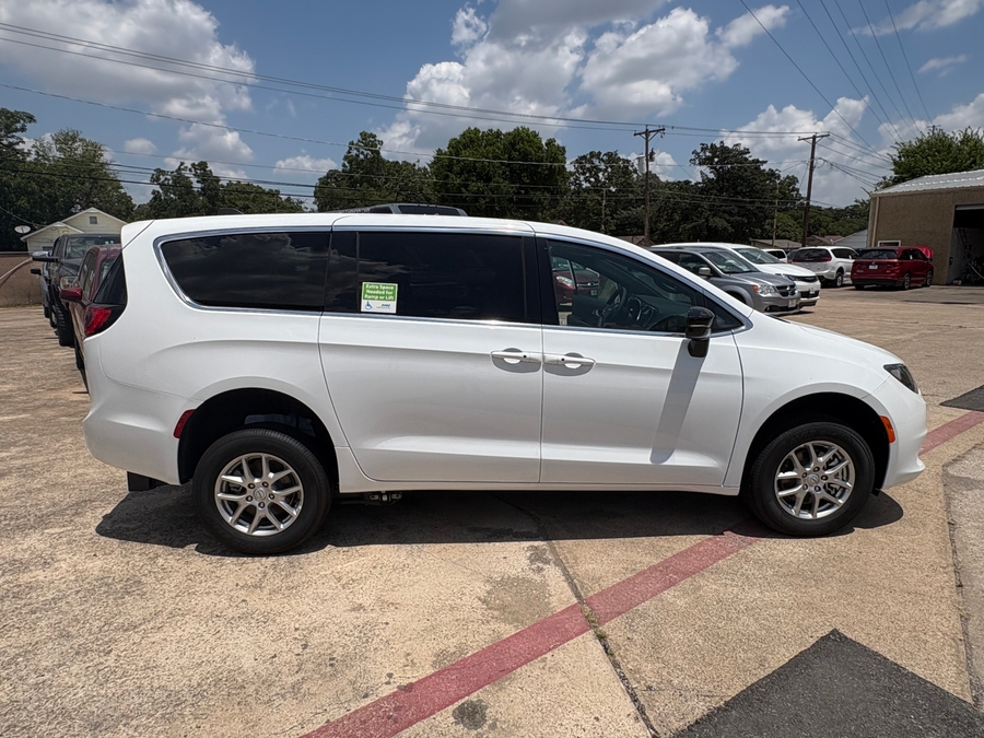 White Chrysler Voyager with FR Conversions Rear Entry Manual Fold Out conversion