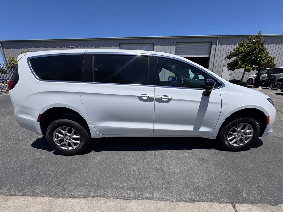 White Chrysler Voyager with FR Conversions Rear Entry Manual Fold Out conversion