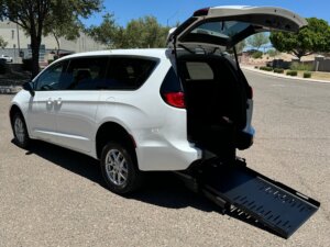 White Chrysler Voyager with FR Conversions Rear Entry Manual Fold Out conversion