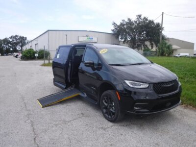 Black Chrysler Pacifica with Driverge Side Entry Automatic Fold Out conversion