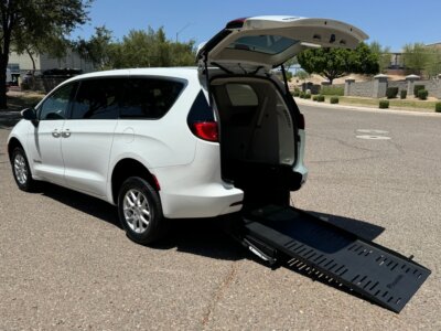 White Chrysler Voyager with BraunAbility Rear Entry Manual Fold Out conversion