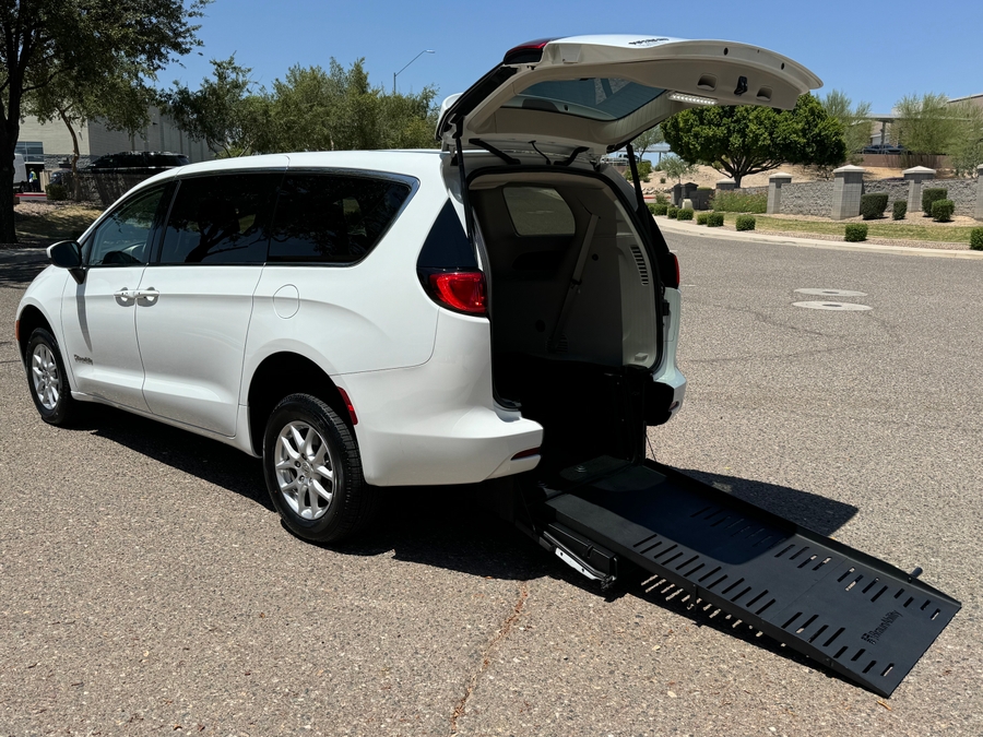 White Chrysler Voyager with BraunAbility Rear Entry Manual Fold Out conversion