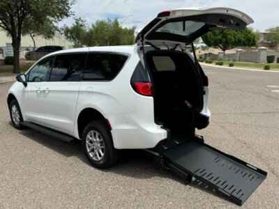 White Chrysler Voyager with FR Conversions Rear Entry Manual Fold Out conversion