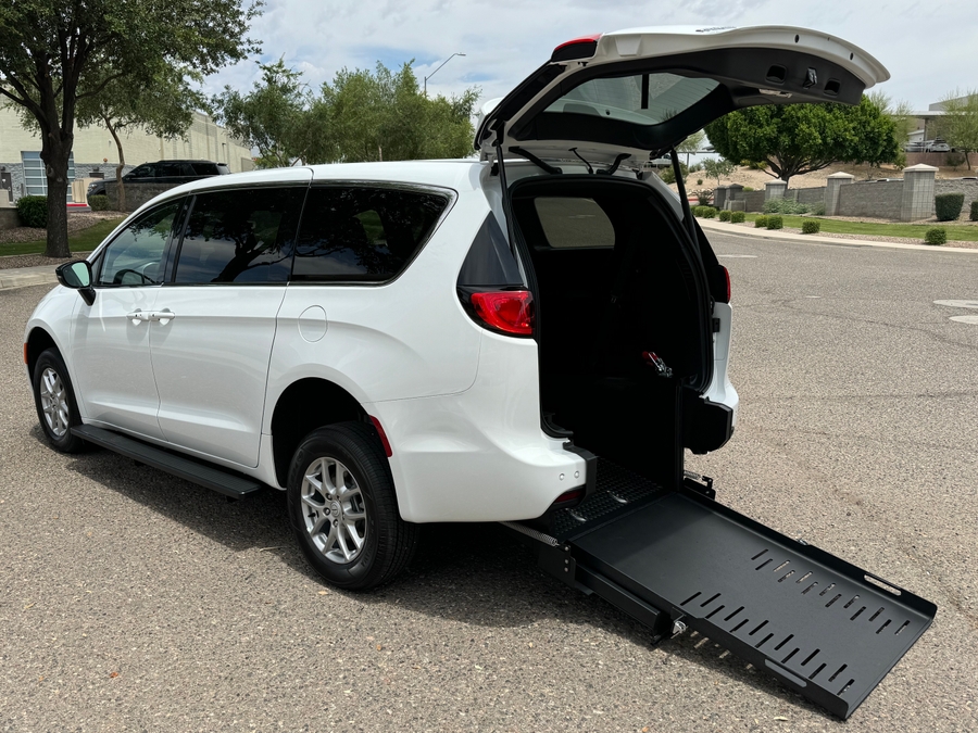 White Chrysler Voyager with FR Conversions Rear Entry Manual Fold Out conversion