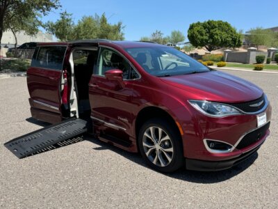 Red Chrysler Pacifica with BraunAbility Side Entry Automatic Fold Out conversion