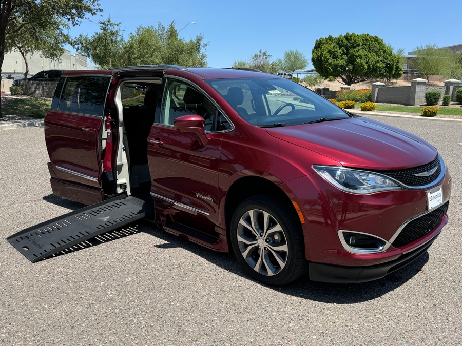Red Chrysler Pacifica with BraunAbility Side Entry Automatic Fold Out conversion