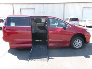 Red Chrysler Pacifica with Driverge Side Entry Automatic Fold Out conversion