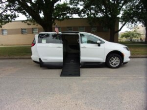 White Chrysler Voyager with Vantage Mobility Side Entry Automatic Fold Out conversion