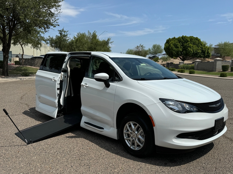 White Chrysler Voyager with Vantage Mobility Side Entry Manual In Floor conversion