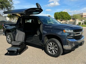 Blue Chevrolet Silverado 1500 with ATC Side Entry Automatic Fold Out conversion