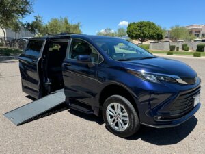 Blue Toyota Sienna with Rollx Side Entry Automatic In Floor conversion