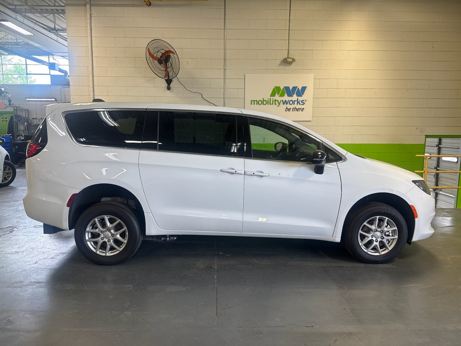 White Chrysler Voyager with FR Conversions Rear Entry Manual Fold Out conversion