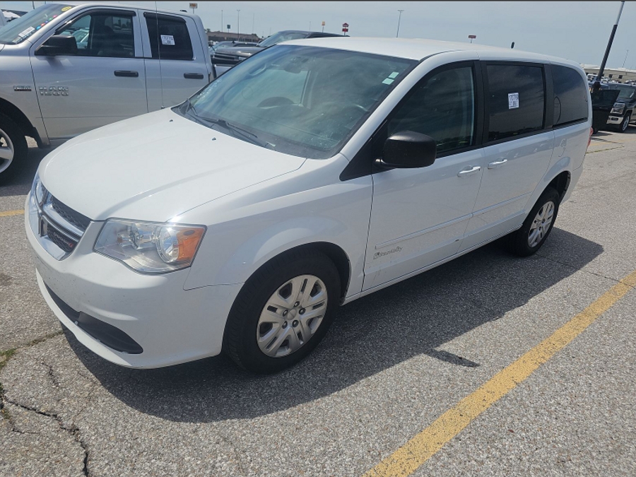 White Dodge Grand Caravan with BraunAbility Rear Entry Manual Fold Out conversion
