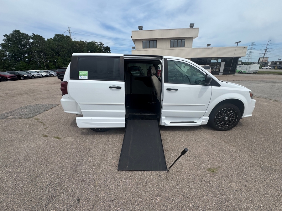 White Dodge Grand Caravan with Vantage Mobility Side Entry Manual In Floor conversion