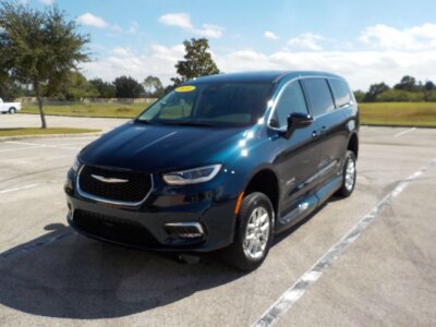 Blue Chrysler Pacifica with Driverge Side Entry Automatic Fold Out conversion