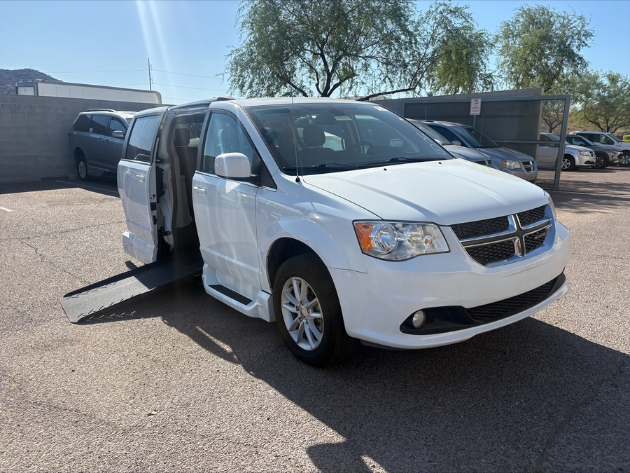 White Dodge Grand Caravan with Vantage Mobility Side Entry Automatic Fold Out conversion