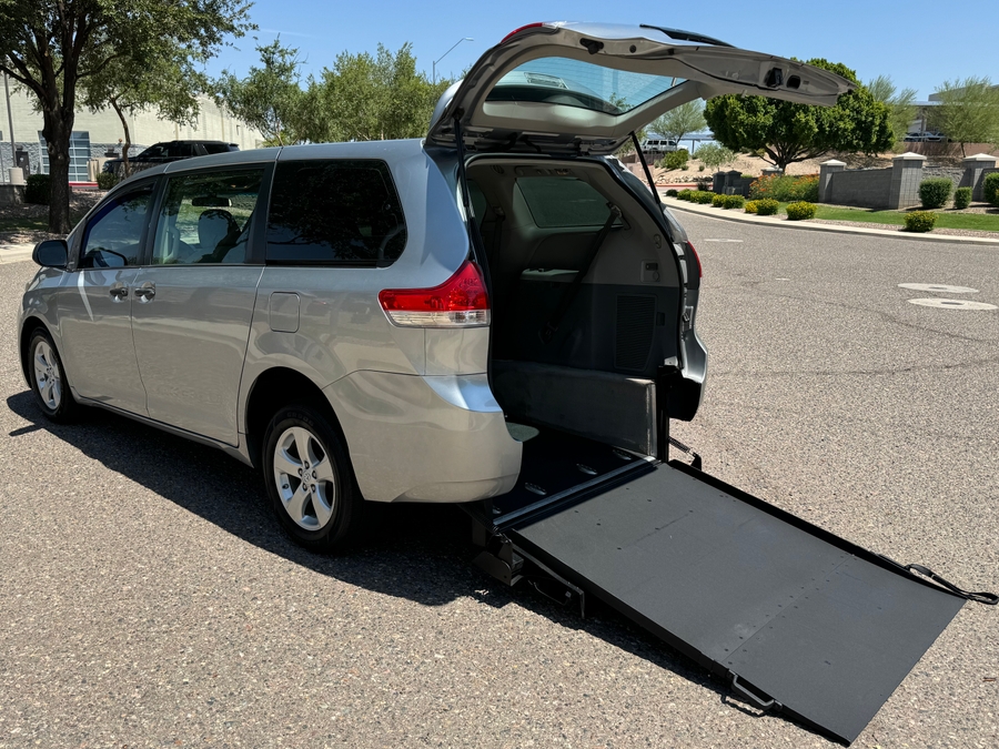 Silver Toyota Sienna with Freedom Motors Rear Entry Manual Fold Out conversion