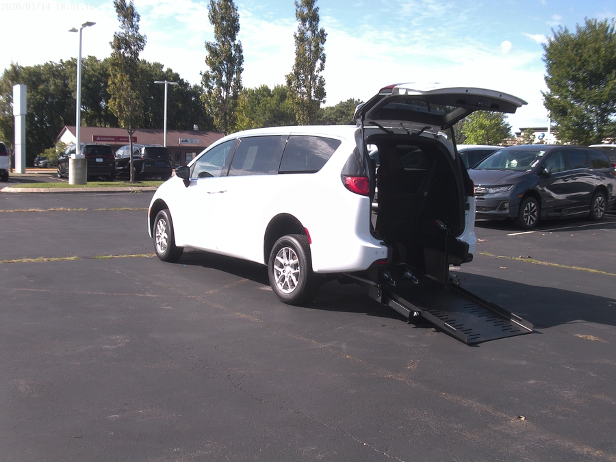White Chrysler Voyager with FR Conversions Rear Entry Manual Fold Out conversion