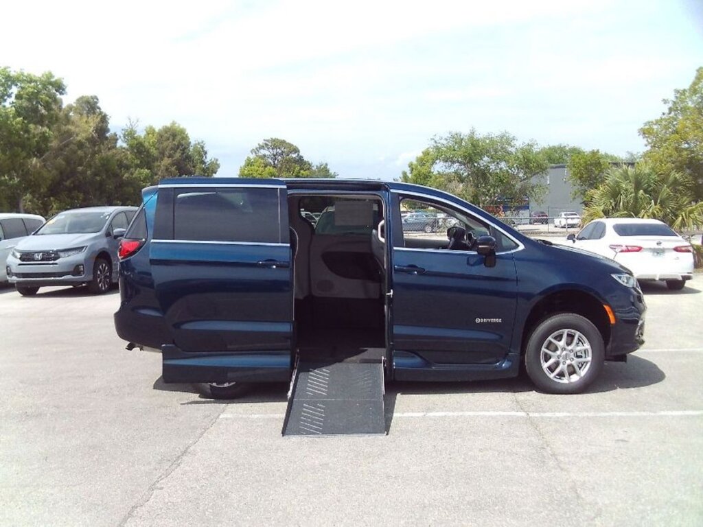 Blue Chrysler Pacifica with Driverge Side Entry Automatic Fold Out conversion
