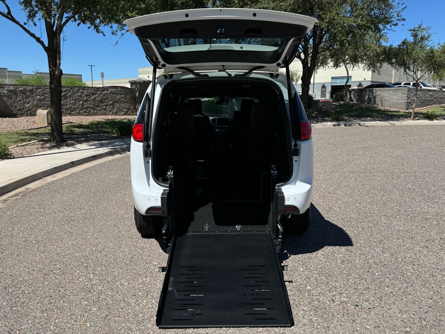 White Chrysler Pacifica with FR Conversions Rear Entry Manual Fold Out conversion