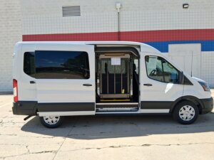 White Ford T350 with Driverge Side Entry Automatic Fold Out conversion