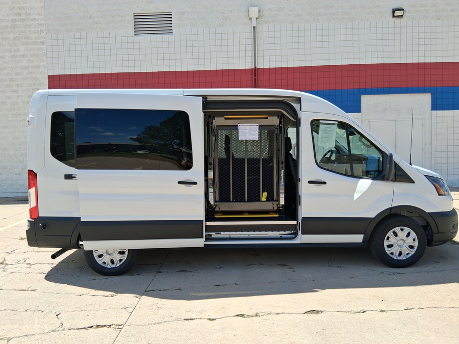 White Ford T350 with Driverge Side Entry Automatic Fold Out conversion