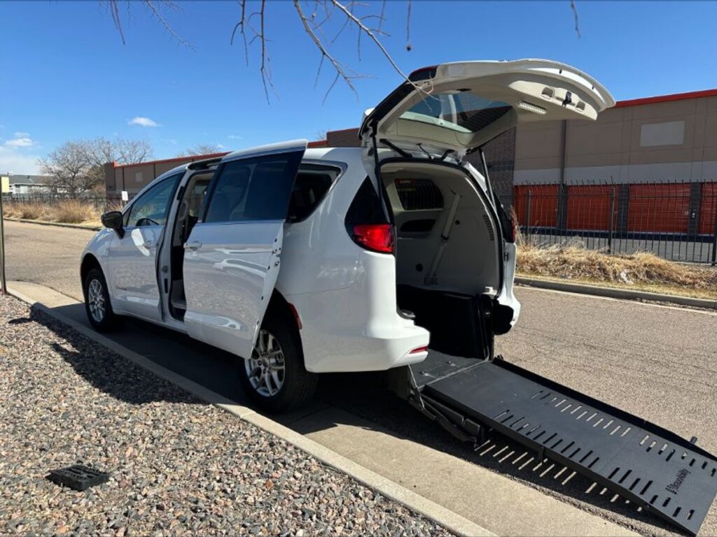White Chrysler Voyager with BraunAbility Rear Entry Manual Fold Out conversion