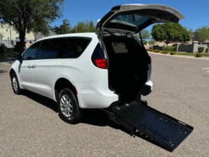 White Chrysler Pacifica with FR Conversions Rear Entry Manual Fold Out conversion