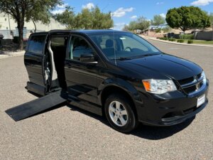 Black Dodge Grand Caravan with Vantage Mobility Side Entry Automatic In Floor conversion