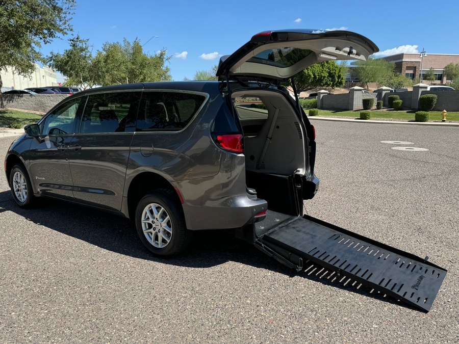 Grey Chrysler Voyager with BraunAbility Rear Entry Manual Fold Out conversion