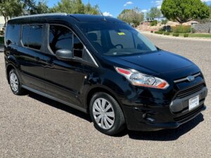 Black Ford Transit Connect with Driverge Rear Entry Manual Fold Out conversion