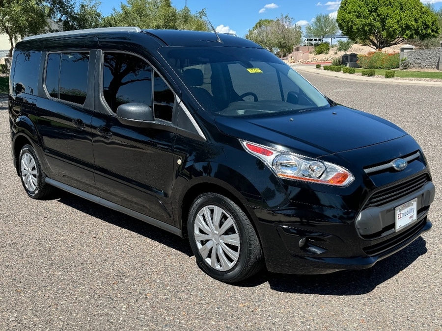 Black Ford Transit Connect with Driverge Rear Entry Manual Fold Out conversion
