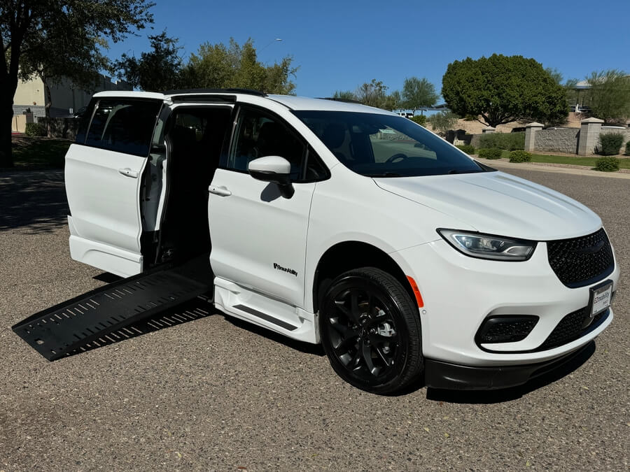 White Chrysler Pacifica with BraunAbility Side Entry Automatic Fold Out conversion