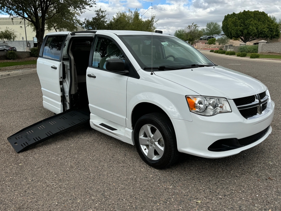 White Dodge Grand Caravan with BraunAbility Side Entry Manual Fold Out conversion
