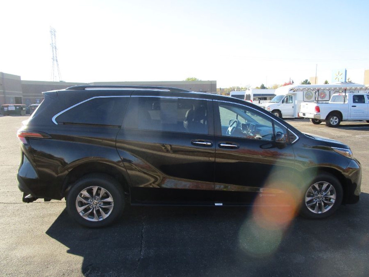 Black Toyota Sienna with Driverge Rear Entry Manual Fold Out conversion