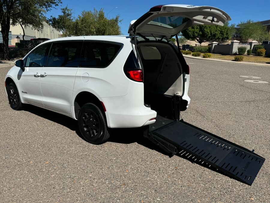 White Chrysler Voyager with BraunAbility Rear Entry Manual Fold Out conversion